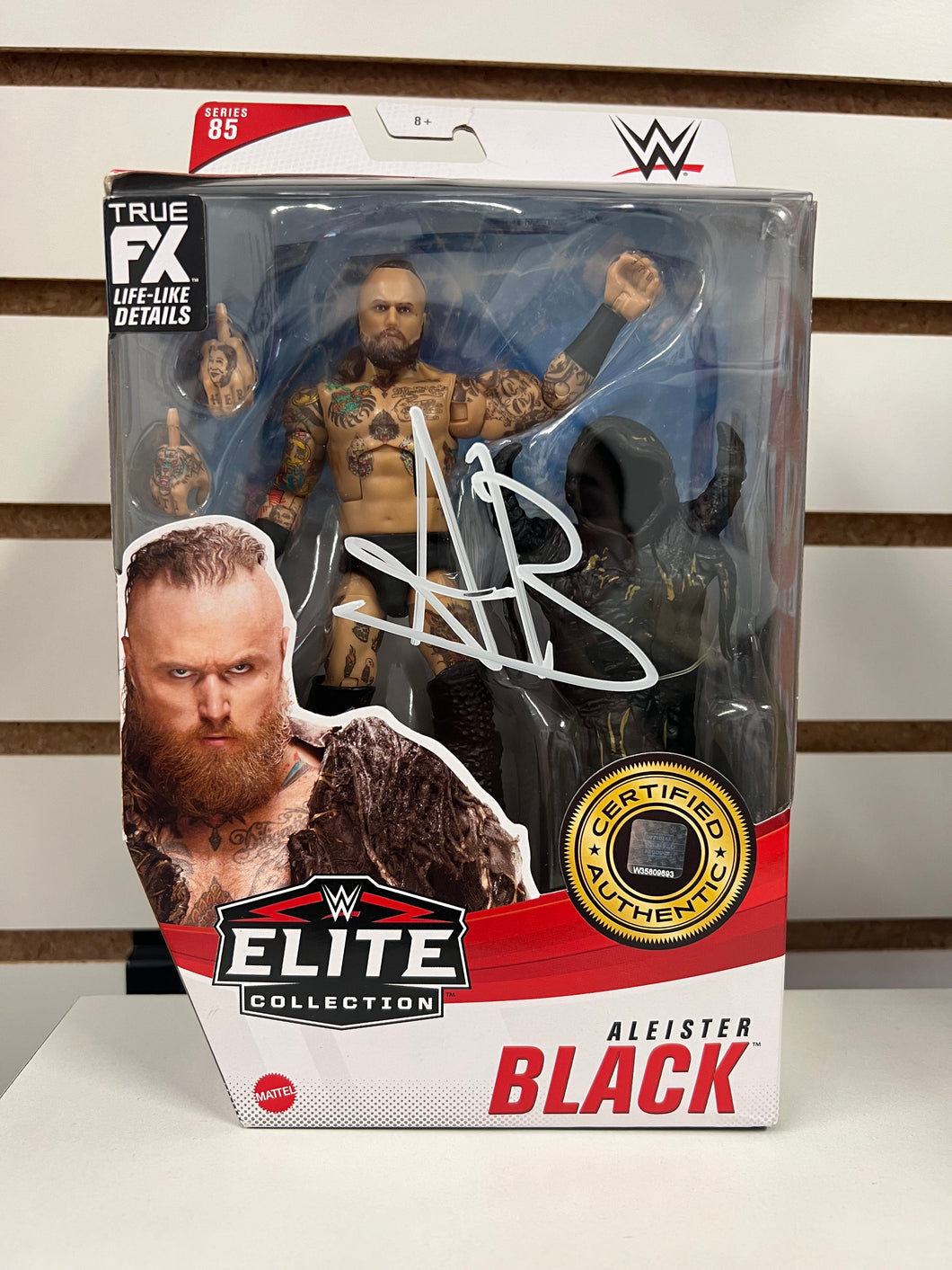 WWE Autographed Elite Malaki Black Figure
