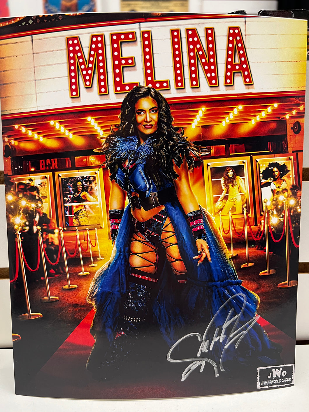 Melina Autographed 8x10 w/ Toploader